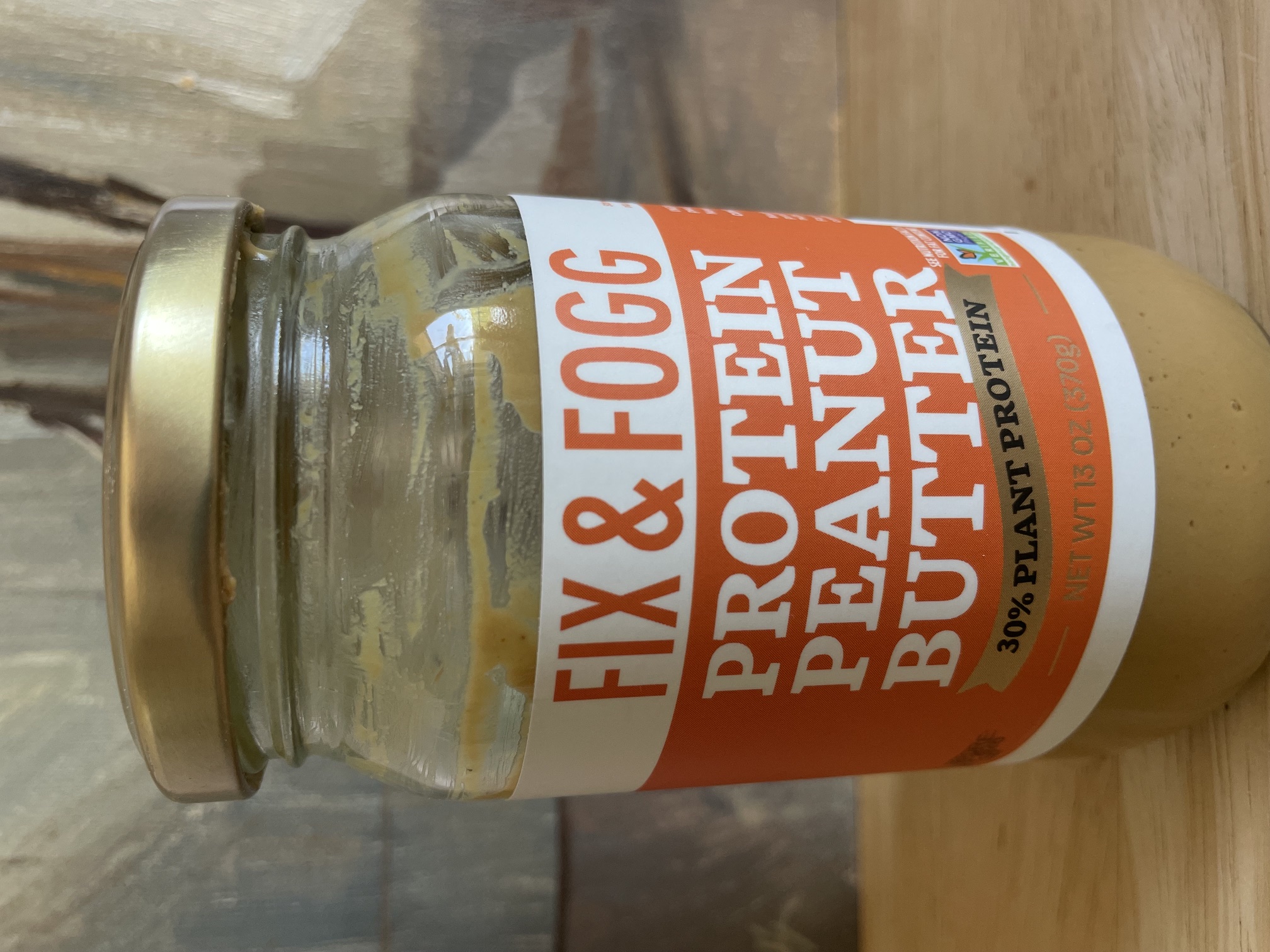 Fix and Fogg Protein Peanut Butter jar with a thirty percent plant protein claim